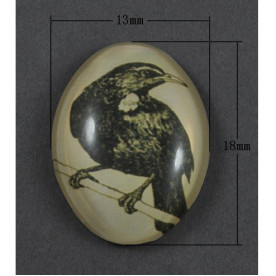 Кабошон Птах темно-оливкового кольору, овальна, розмір 13х18 мм.