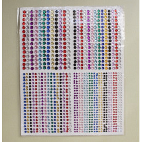 Большой набор страз разных размеров и цветов, размер листа 19х24 см.