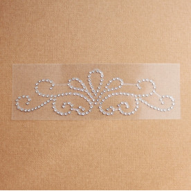 Візерунок з страз сріблястого кольору, 15х5 см.