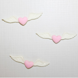 Пластиковий кабошон На крилах любові кремового кольору, 52х14 мм, 1 шт
